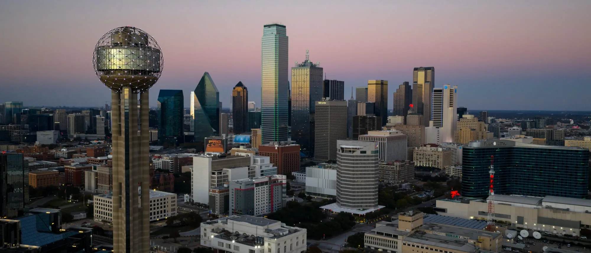 The Dallas skyline at dusk, with Reunion Tower and the downtown core